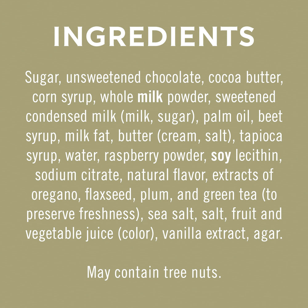 Milk chocolate caramel square close-up showcasing creamy center and smooth texture.