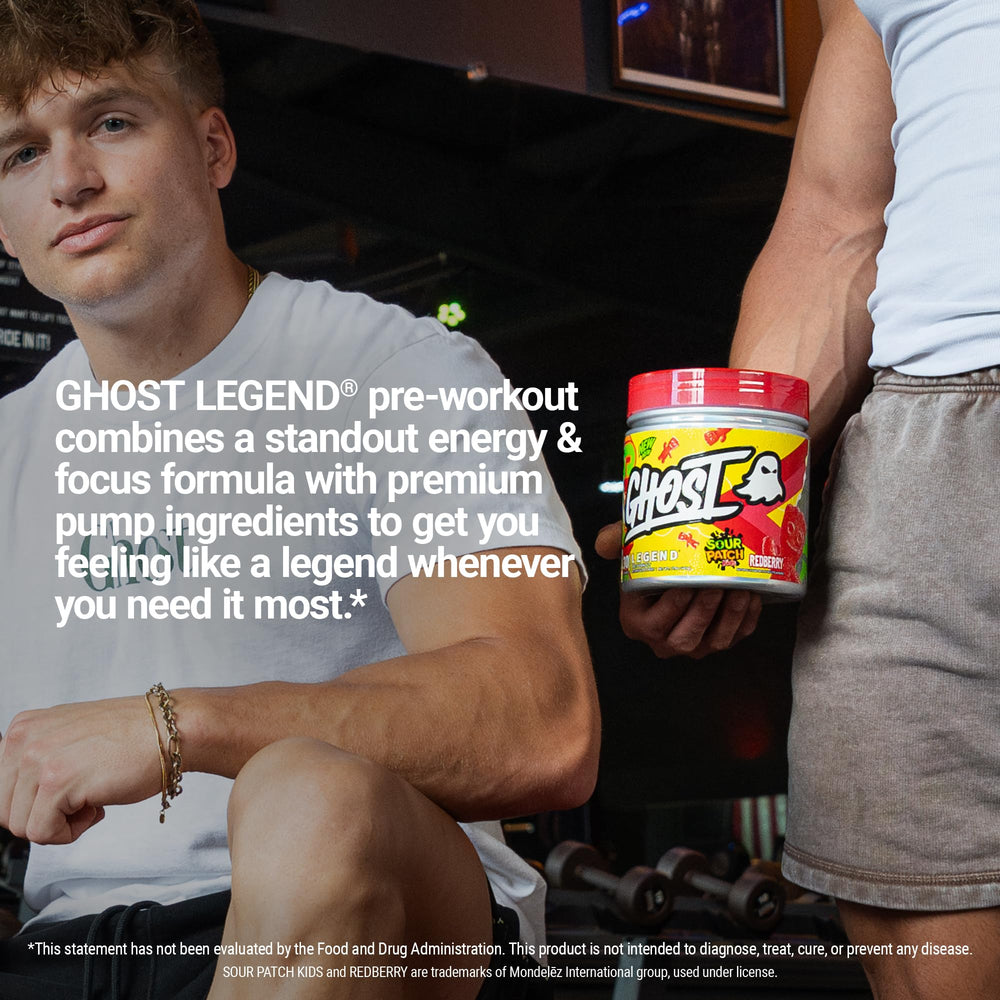 GHOST Legend scoop beside glass conveys convenient energy boost for workouts