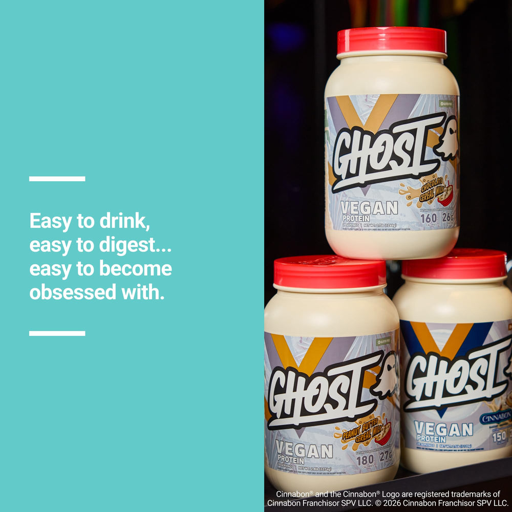 Serving scoop beside tub highlights 25g protein per serving.
