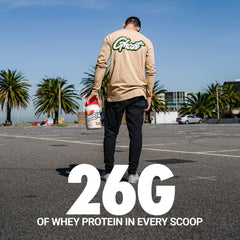 GHOST Whey Peanut Butter Cereal Milk pour demonstrates smooth mixability for shakes.