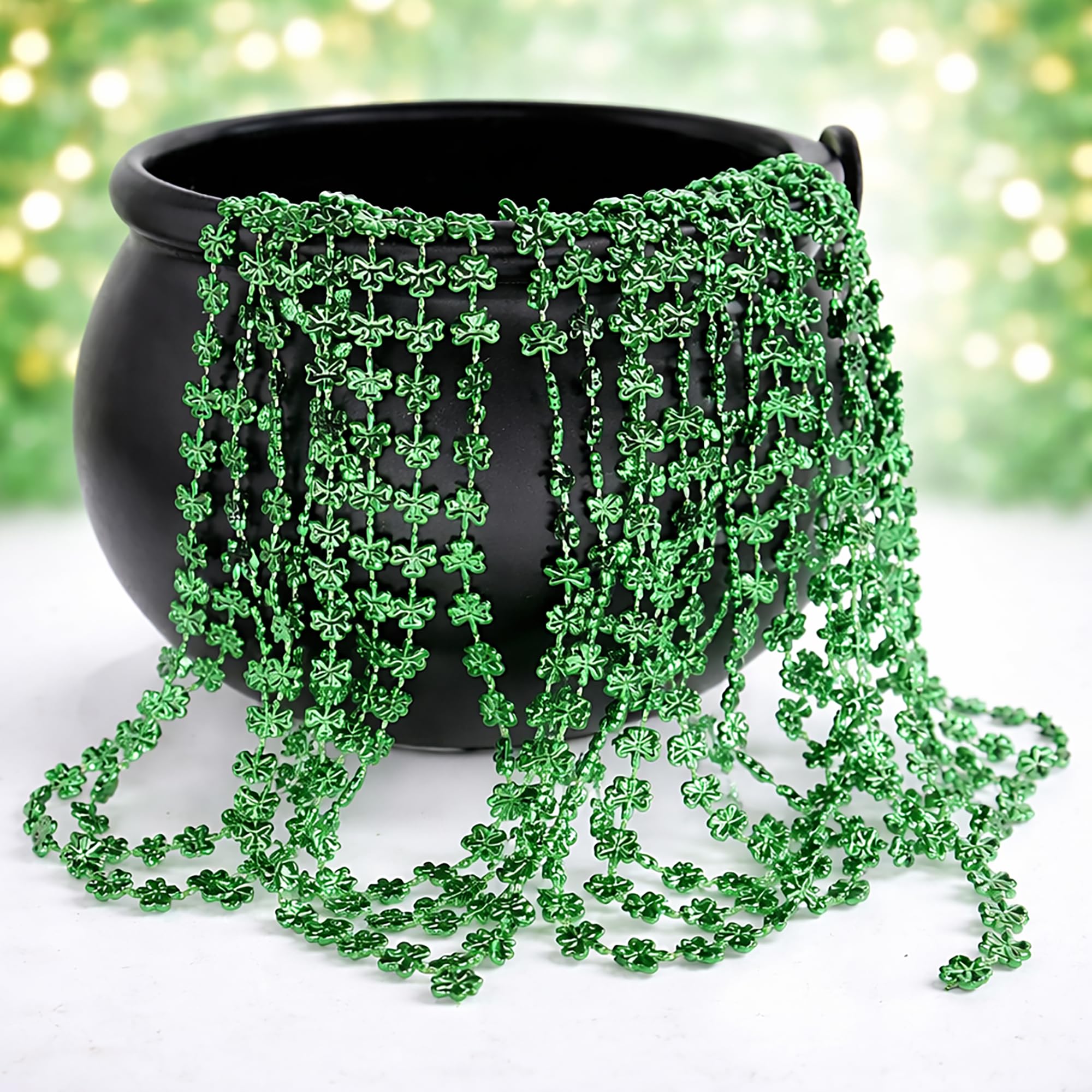 GiftExpress green shamrock necklaces on model showcase bold party-ready style.