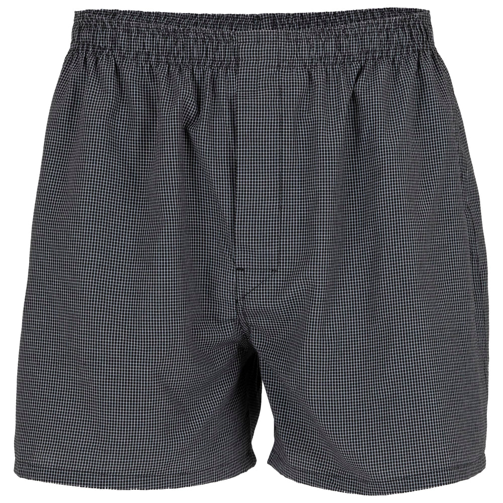 Gildan boxers laid flat under pants for a smooth silhouette.