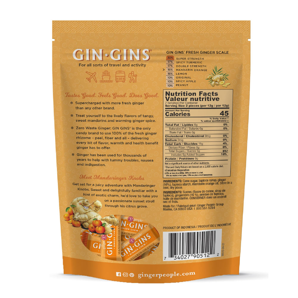 The Ginger People GIN GINS Mandarin Orange Chews close-up of ginger piece offering a zesty bite.