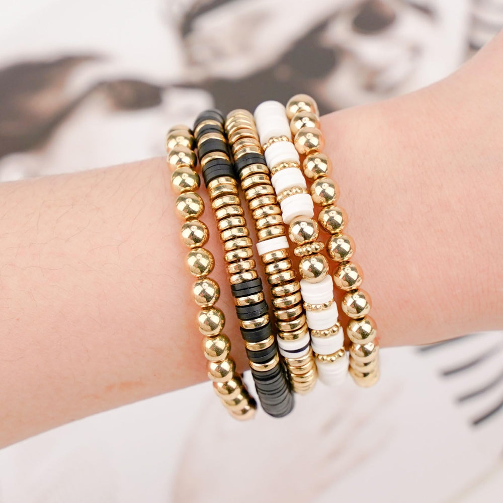 Gionlion golden beads detail adds chic shine to handmade pieces.