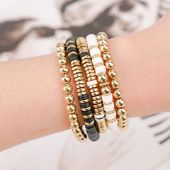Gionlion golden beads detail adds chic shine to handmade pieces.