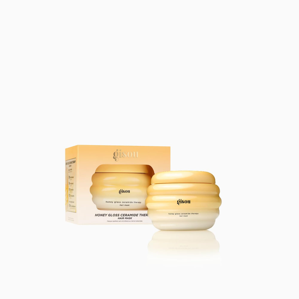 Gisou Honey Gloss Ceramide Therapy Hair Mask jar open shows creamy texture for smoothing.