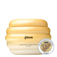 Gisou Honey Gloss Ceramide Therapy label close-up highlights ceramides and honey.