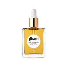 Gisou Honey Infused Hair Oil bottle pour demonstrates lightweight hydration for hair health