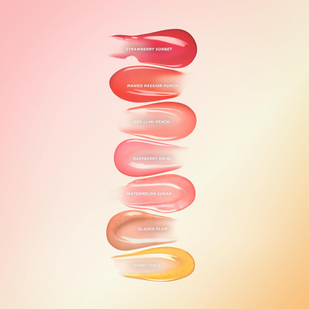 Honey Gold shade swatch on lips for radiant shine.