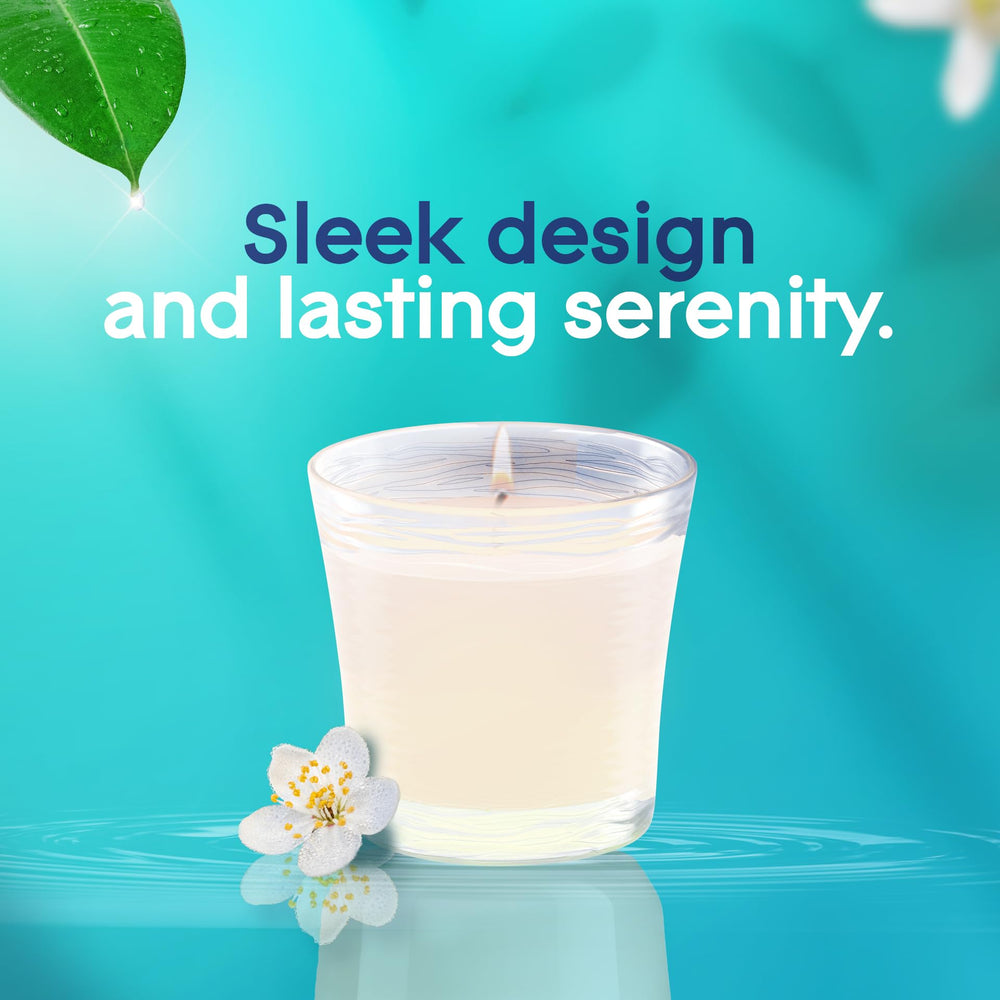 Glade Dew Drop Petals candle on table for quick room refresh