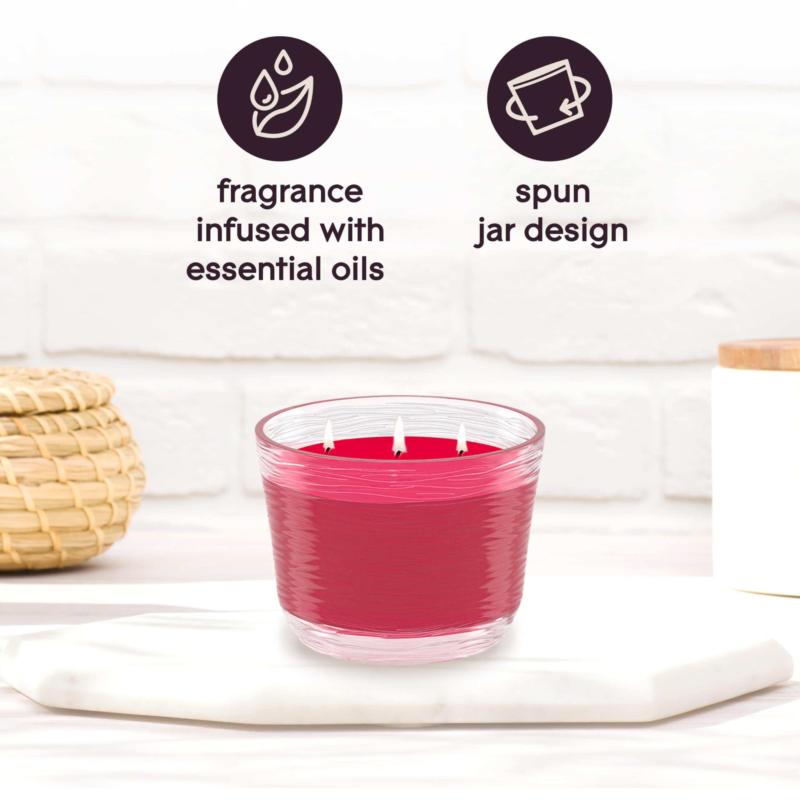 Glade essential oils infused candle emphasizes apple and cinnamon scent in any room.