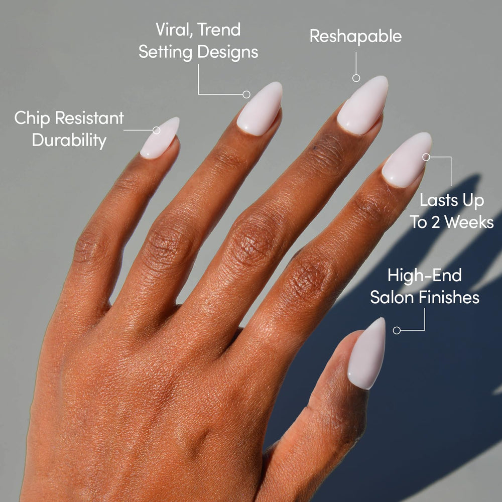 Close-up of Sugar Doll almond nails highlighting the soft milky pink shade