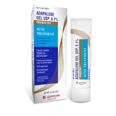 Glenmark Adapalene Gel tube on counter for nighttime acne care