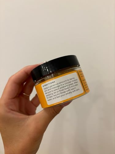Glo Melanin turmeric scrub texture close-up emphasizes grainy exfoliants.