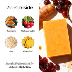 Bar of Glo Melanin turmeric soap on a clean surface.