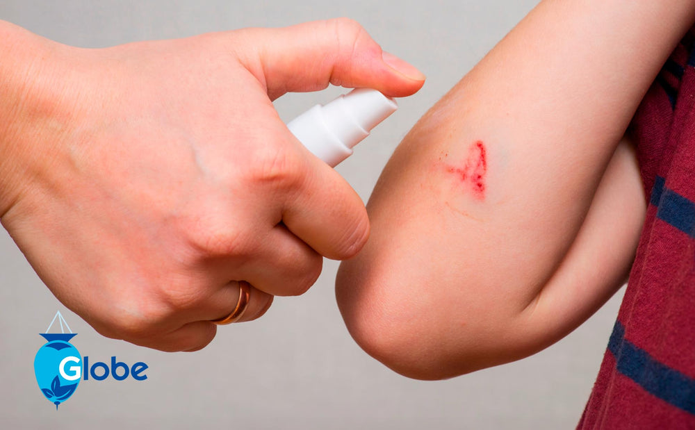 Globe antiseptic spray in a first aid kit for emergencies