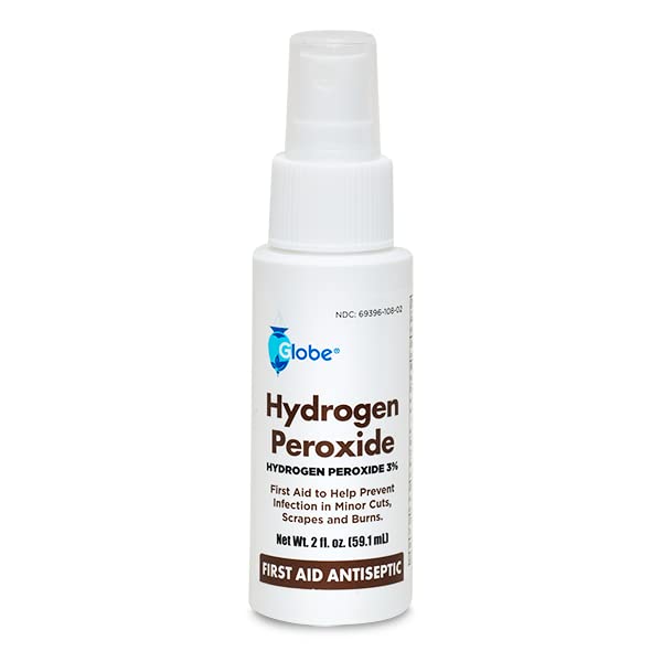 Globe three-pack display of hydrogen peroxide spray for home first aid.