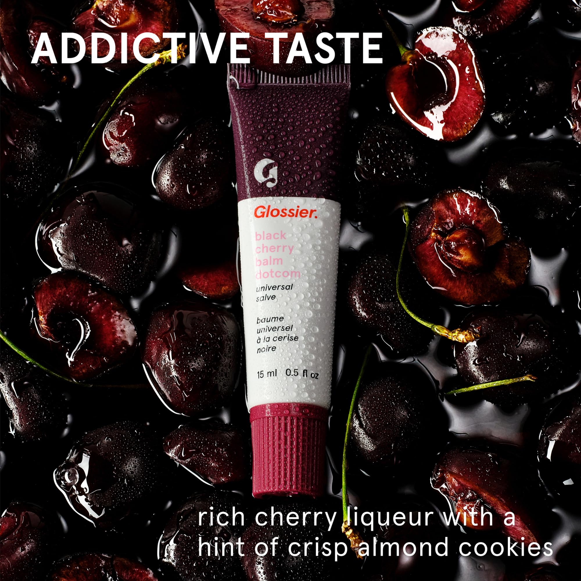 Glossier Balm Dotcom closeup highlights beeswax and lanolin for lasting moisture.