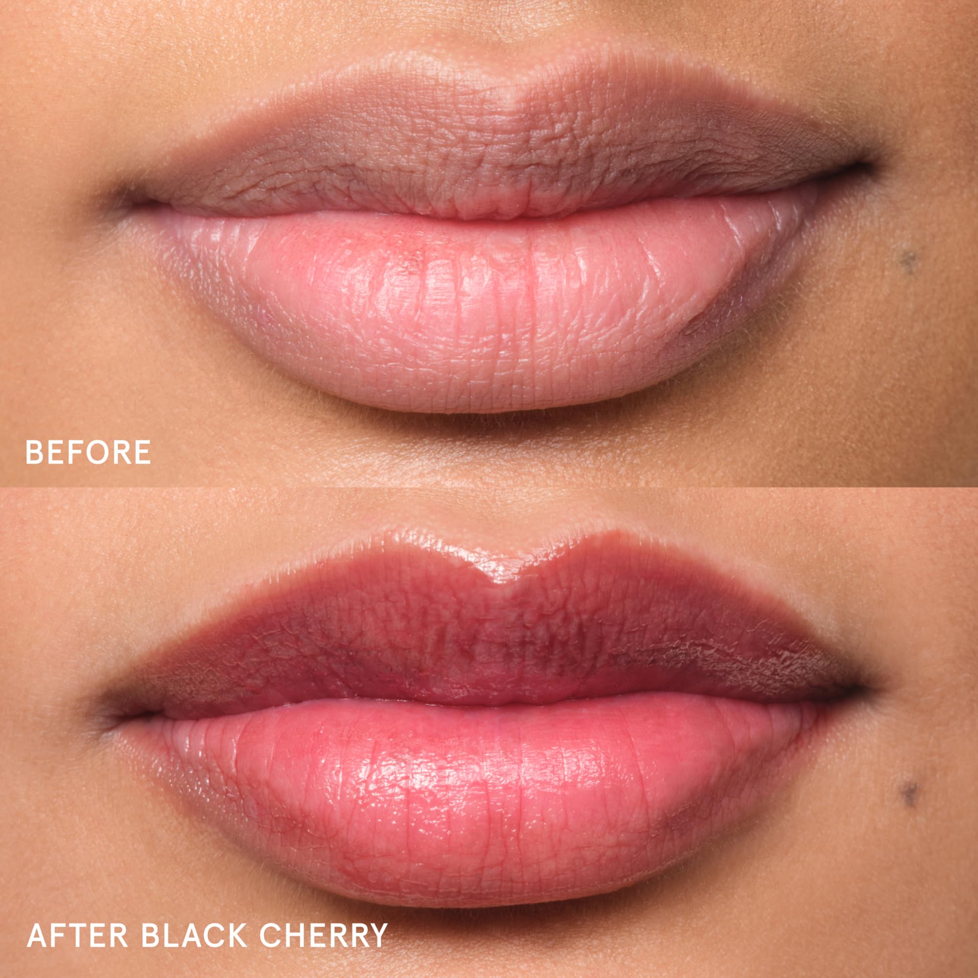Glossier Balm Dotcom on lips with subtle burgundy tint and hydration.