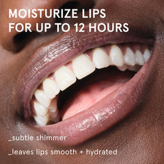 Glossier Balm Dotcom applied to dry cuticles for smoother hands.