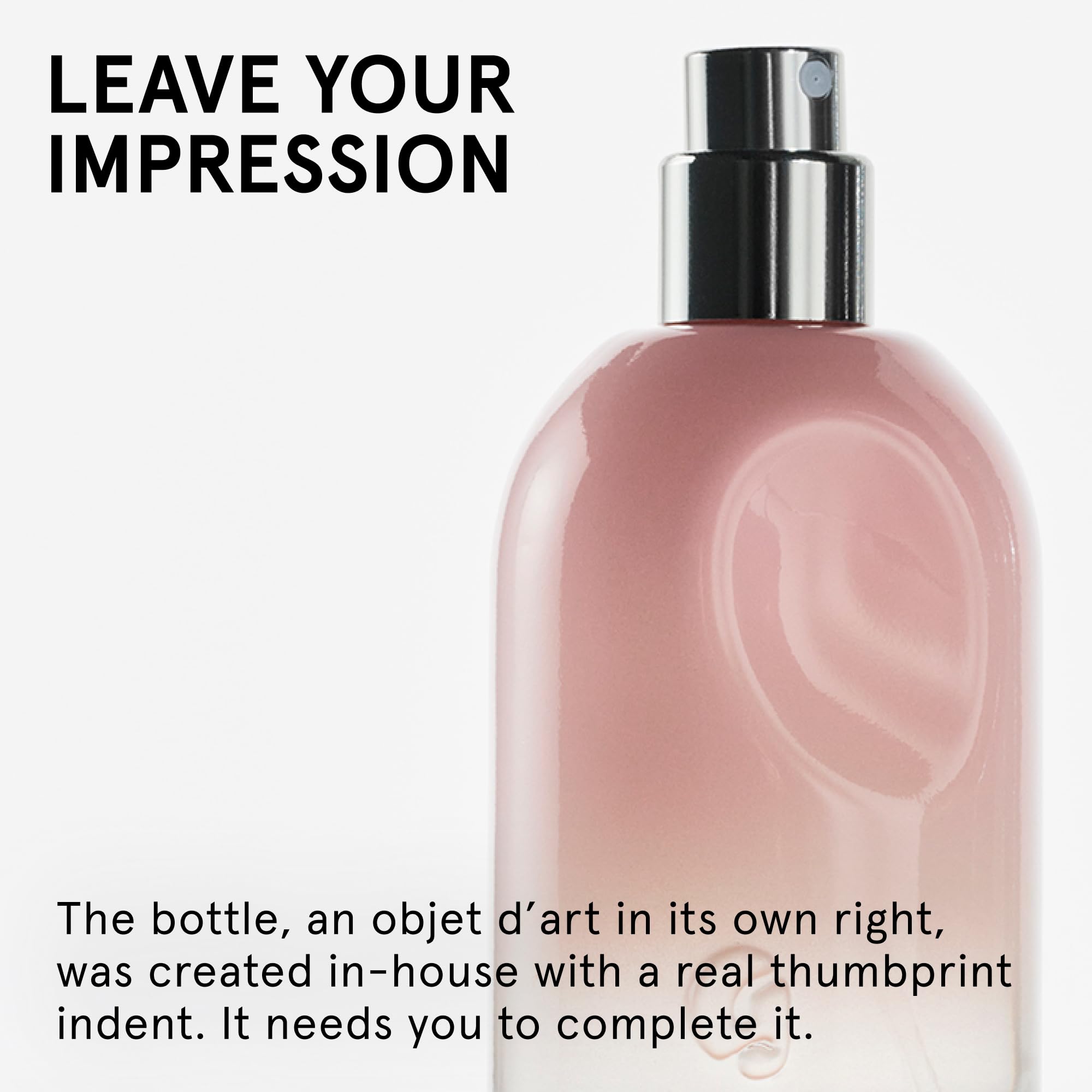 Glossier You cap detail on a sleek bottle with soft finish.