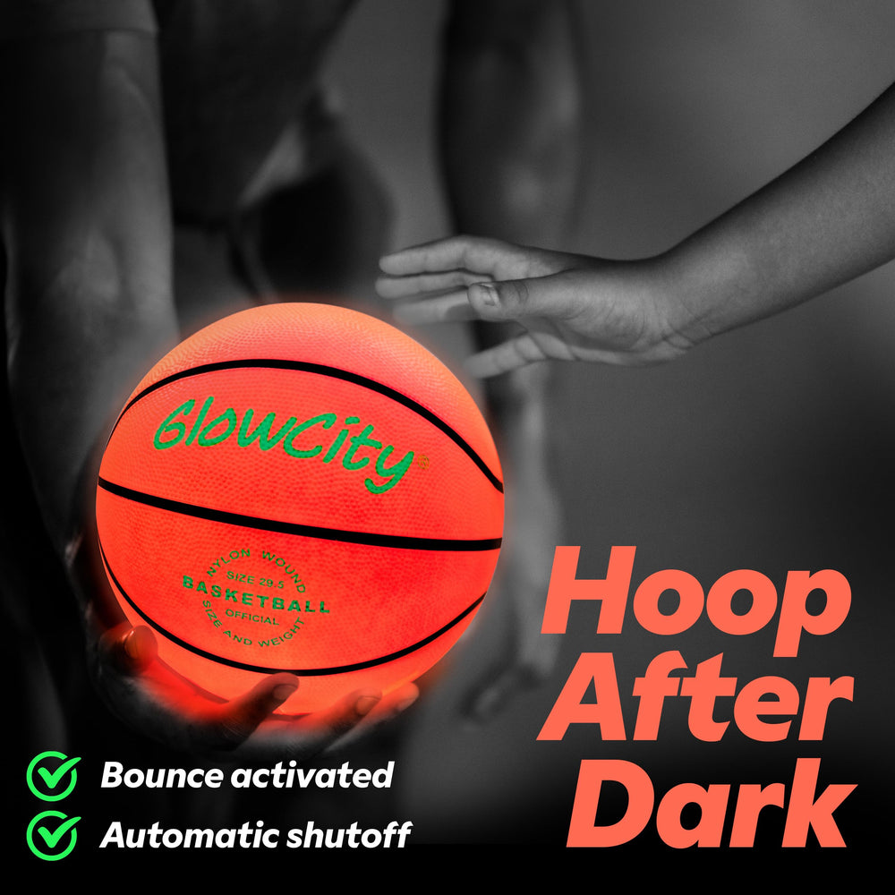 GlowCity glow-in-the-dark basketball in bounce action for night games.