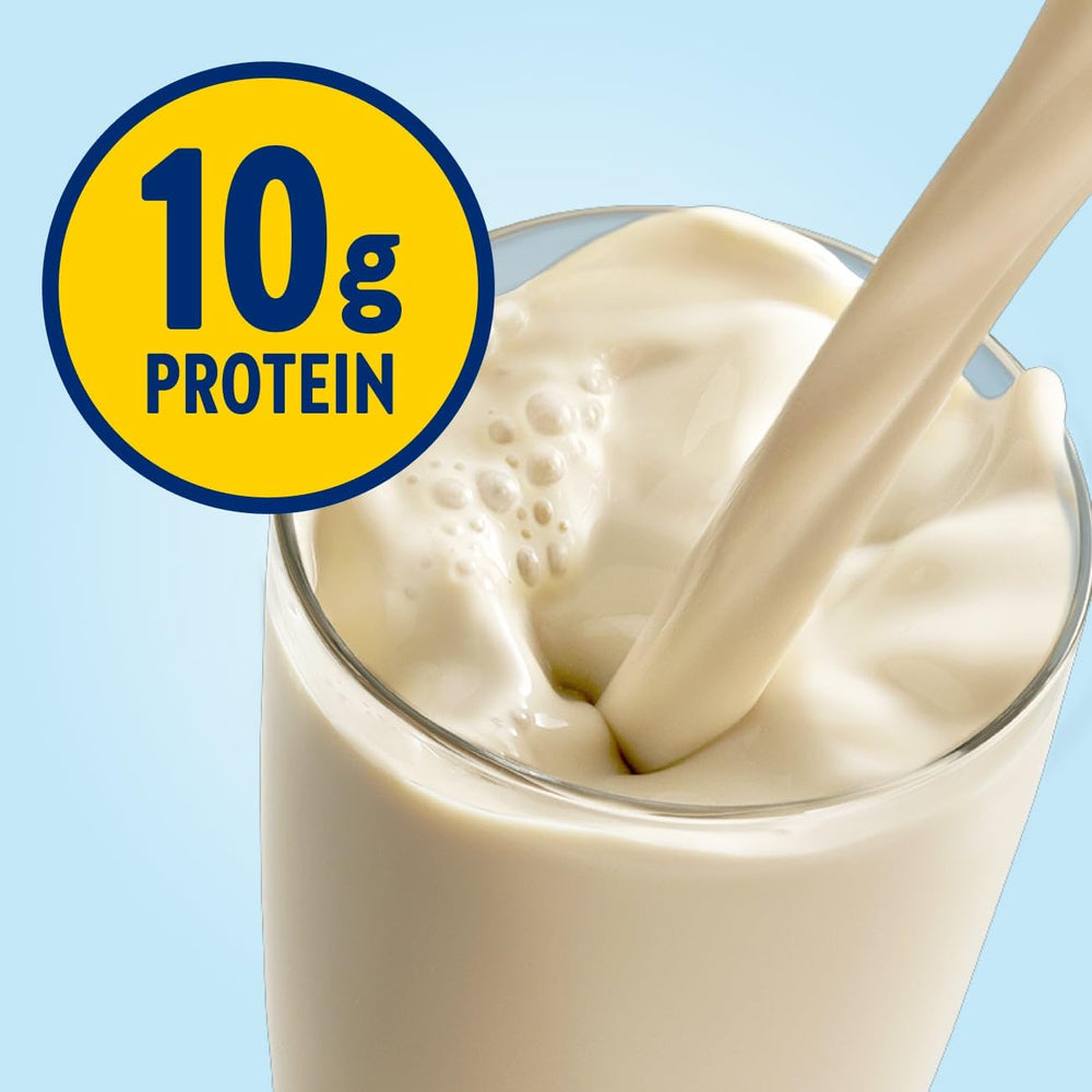 Pouring Glucerna Original vanilla shake into a glass for a quick meal replacement.