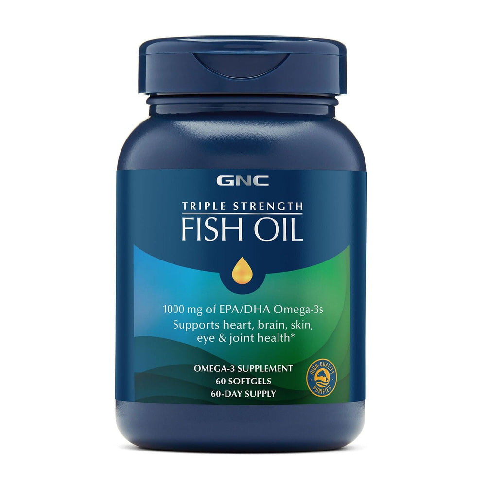 GNC Triple Strength Fish Oil bottle and capsules support heart and brain health.