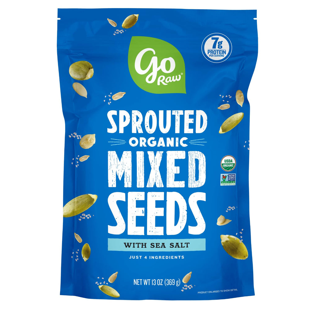Go Raw organic sprouted pumpkin seeds close-up showing crunchy, protein-rich snack.