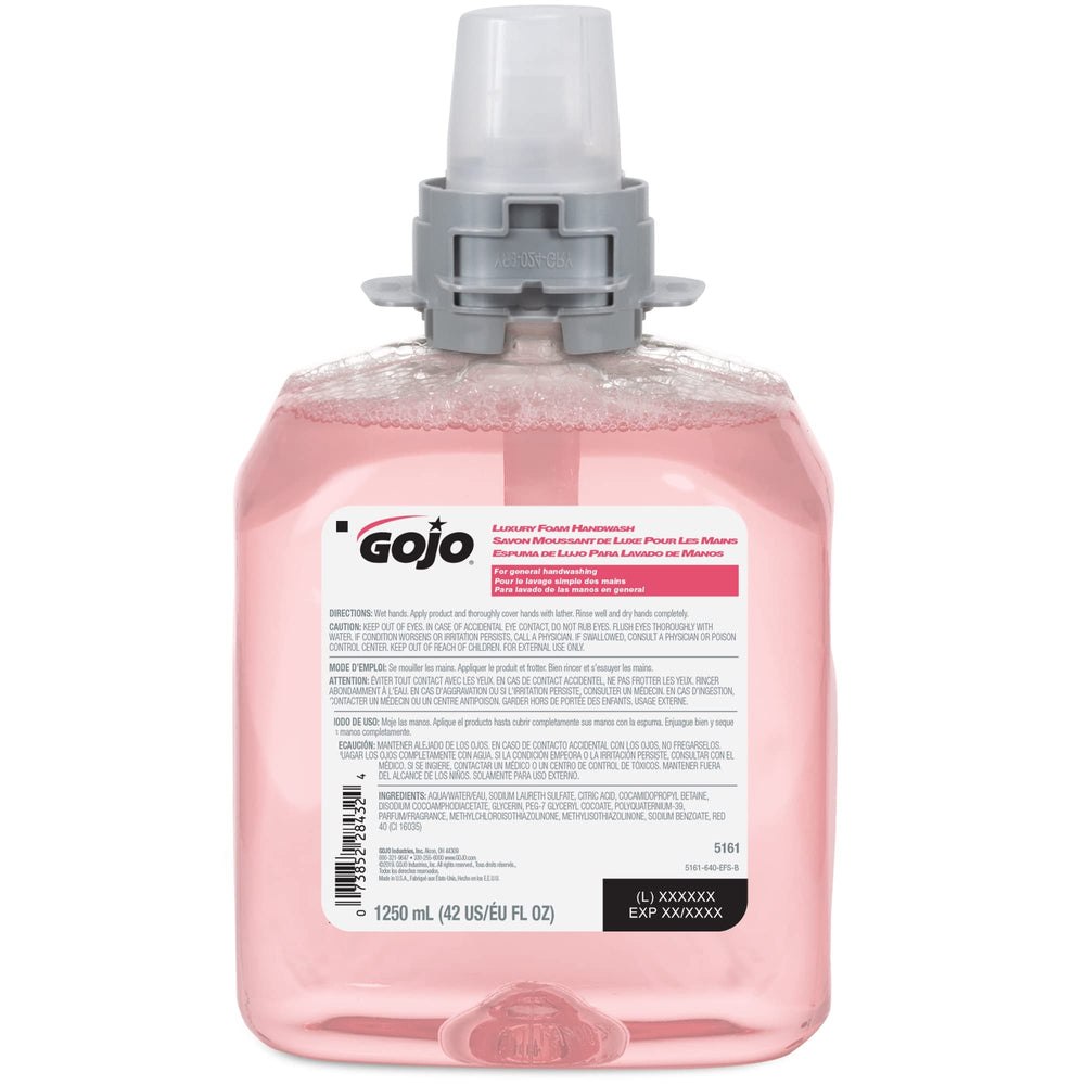 GOJO FMX-12 cranberry foam refill close-up with rich lather ready to dispense.