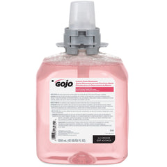 GOJO FMX-12 cranberry foam refill close-up with rich lather ready to dispense.
