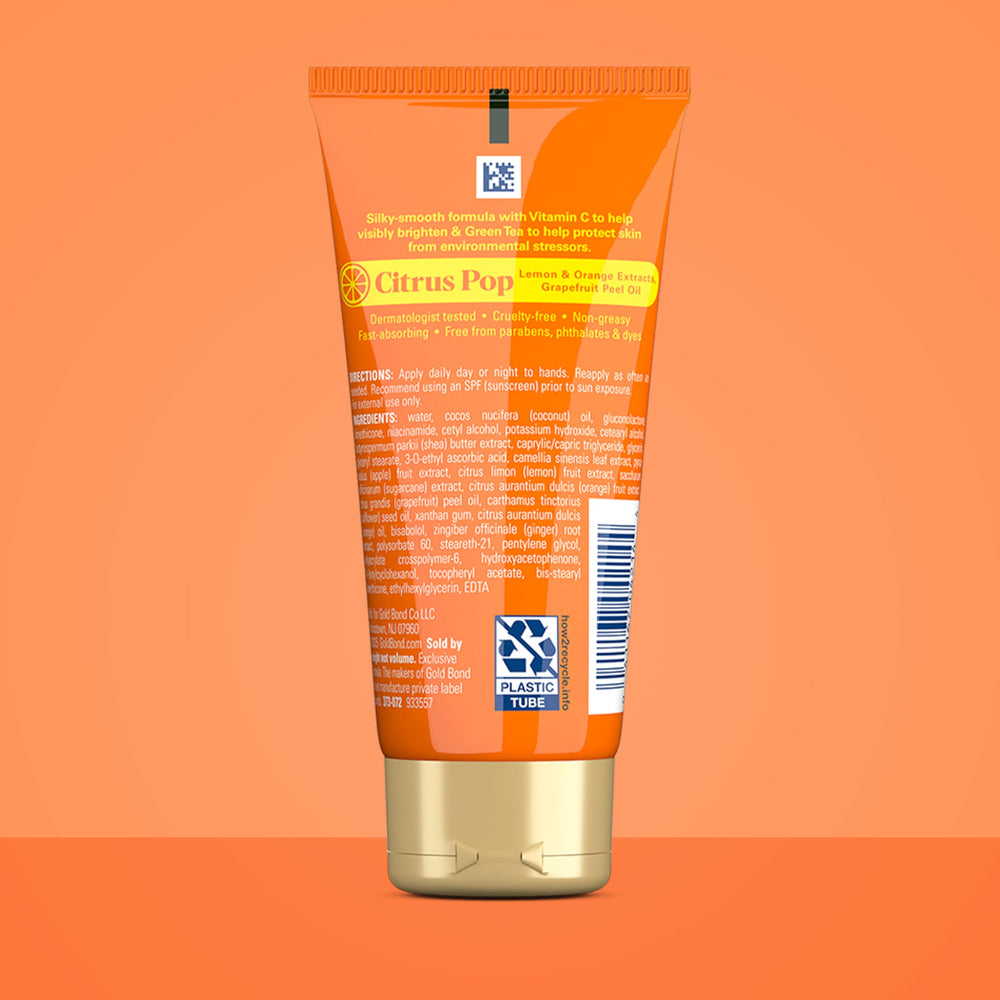 Gold Bond Citrus Pop Glowing Hand Cream bottle close-up showing vitamin C brightening.