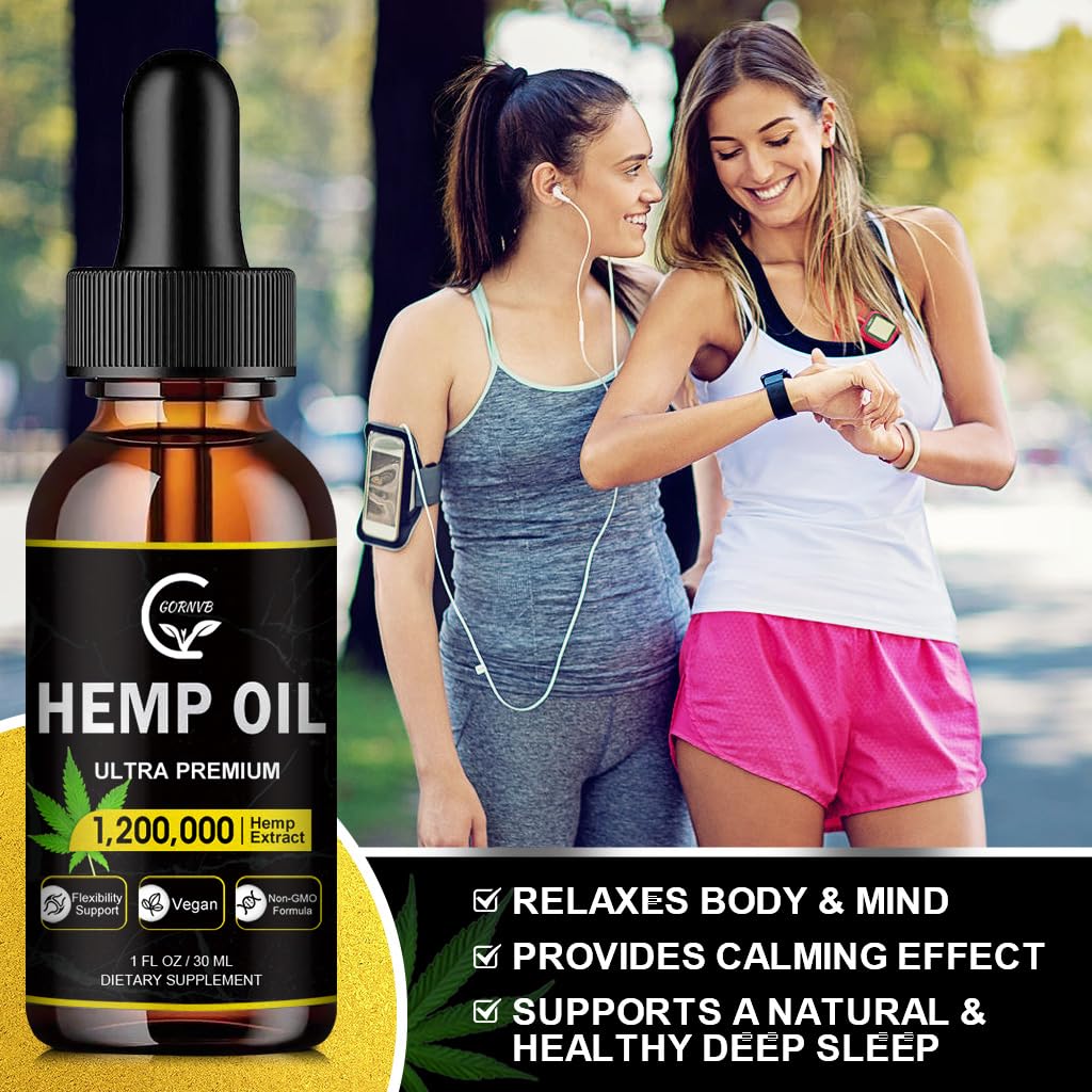 Hemp oil being poured to show smooth texture and rich color.