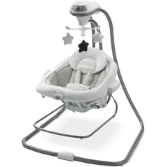 Graco DuetConnect LX swing seat with portable bouncer carry handles for easy room-to-room use.