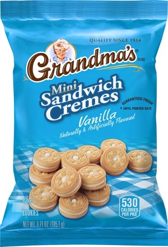 Close shot of vanilla crème filling between crisp cookies from Grandma's mini cookies.