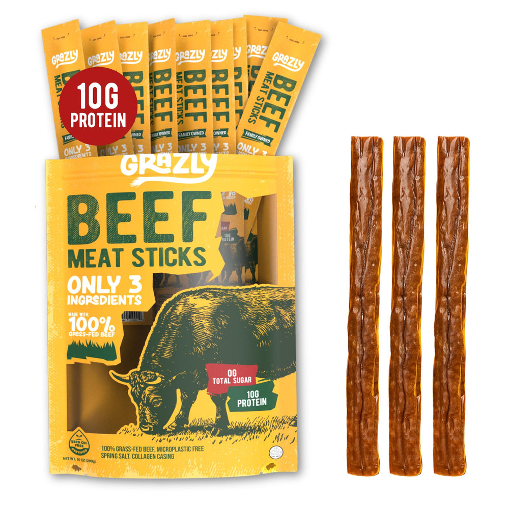 Grazly grass-fed beef sticks on a wooden board showing a high-protein snack.