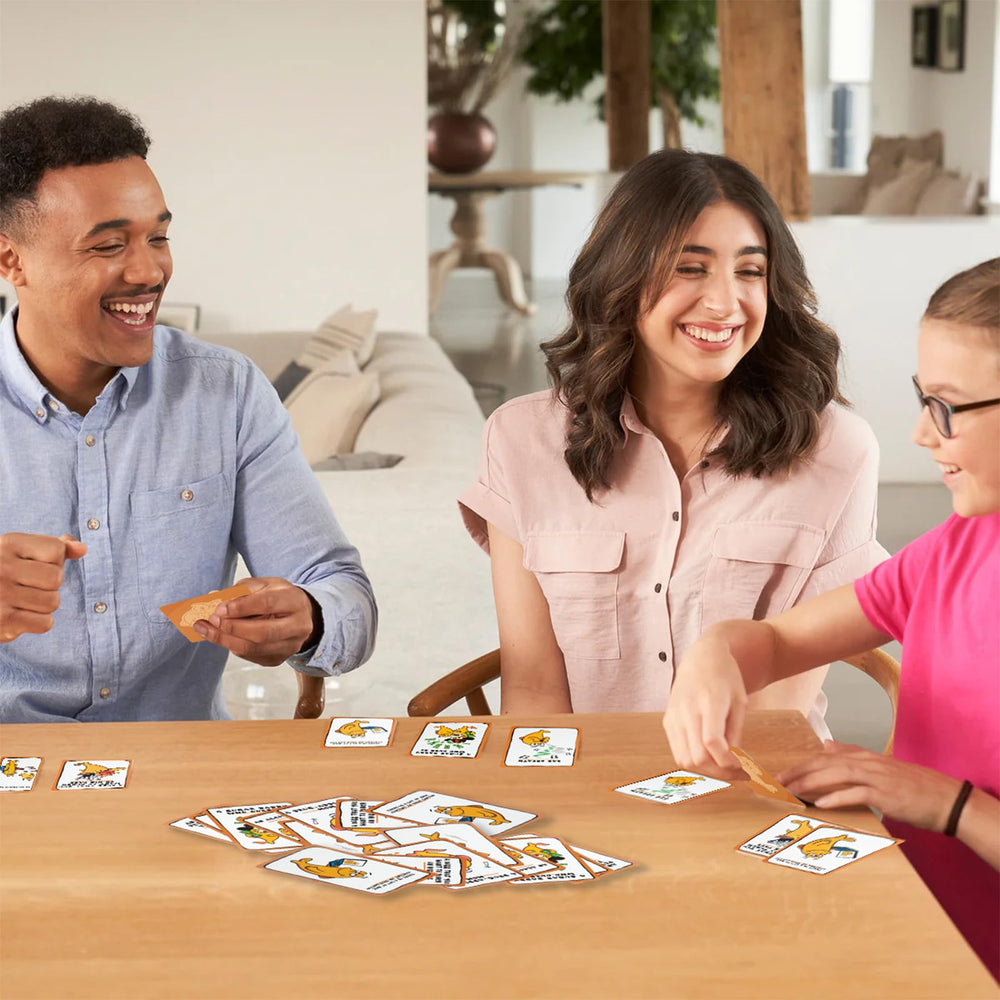 GRBeid Go Fucl Yourself game night scene with adults enjoying laughs and cheeky cards.