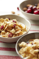 Great Grains Cranberry Almond Crunch cereal almonds and crunchy clusters on a spoon provide crunch.