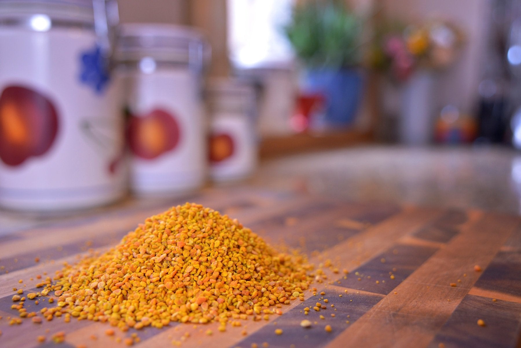 Scoop of Greenbow Bee Pollen ready to mix into smoothies.