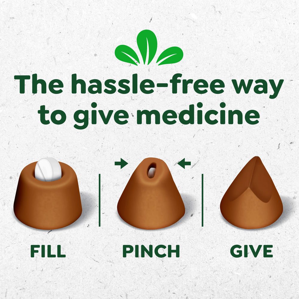 Greenies Pill Pockets pocket opened with a pill for simple administration.