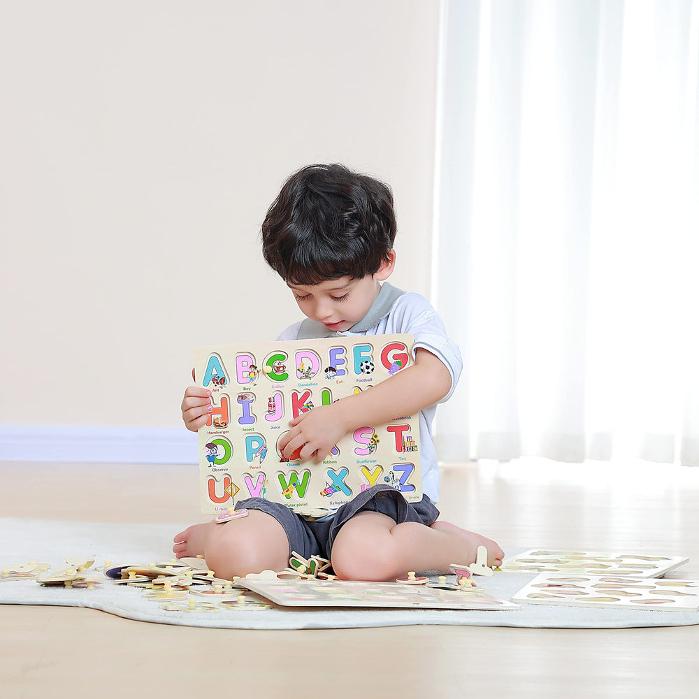 GR GRINNNIE wooden peg puzzle ABC letters promote literacy basics and hand eye coordination.