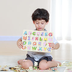 GRINNNIE wooden puzzle featuring letters to boost language skills.