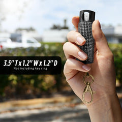 Guard Dog Security stun gun with flashlight for emergency protection and visibility.