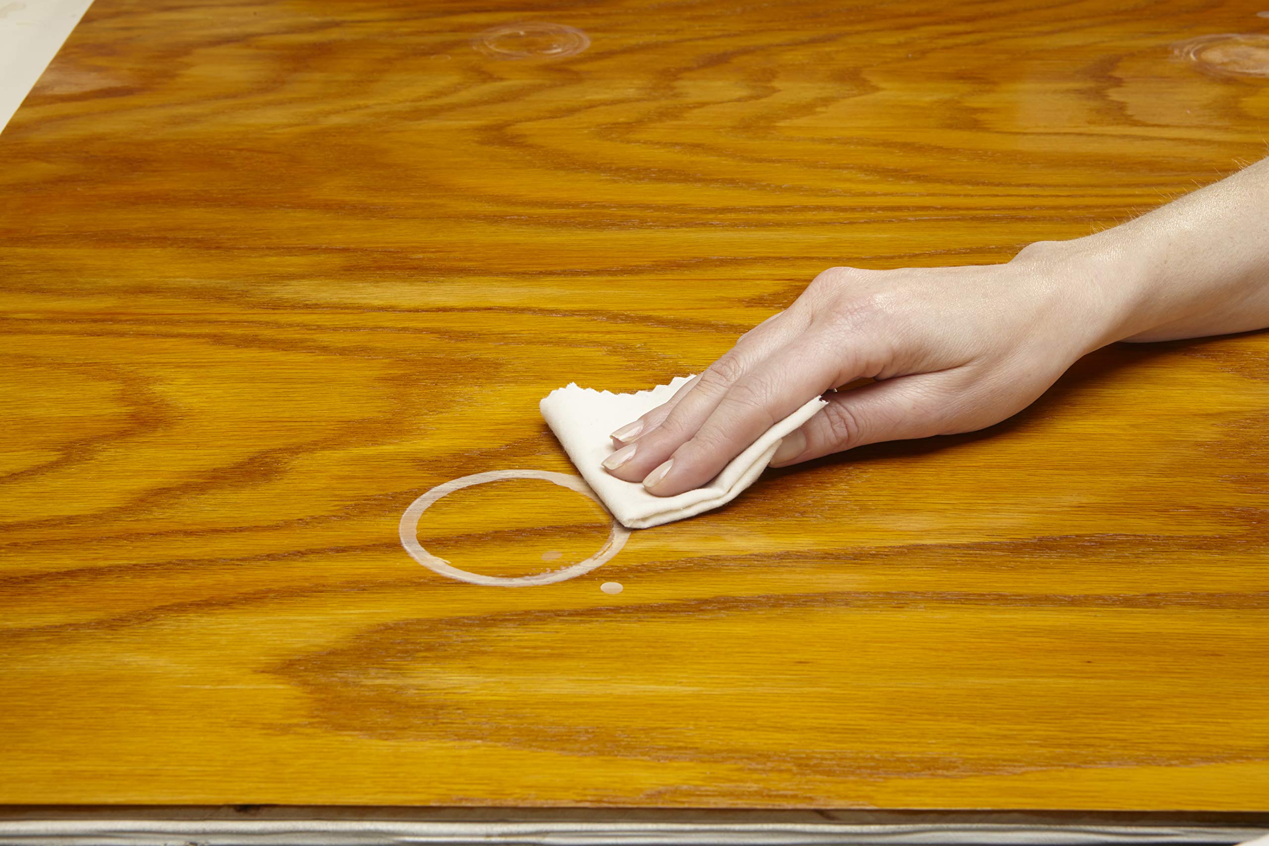 Guardsman water ring remover cloth addressing minor blemishes and scratches.
