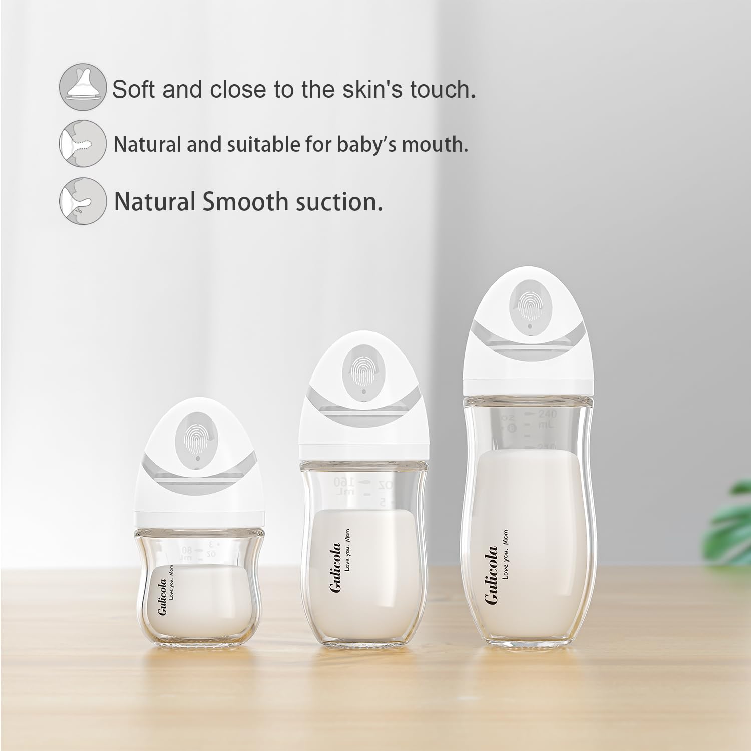 Gulicola glass bottle in use during nursing transition for smooth feeding.