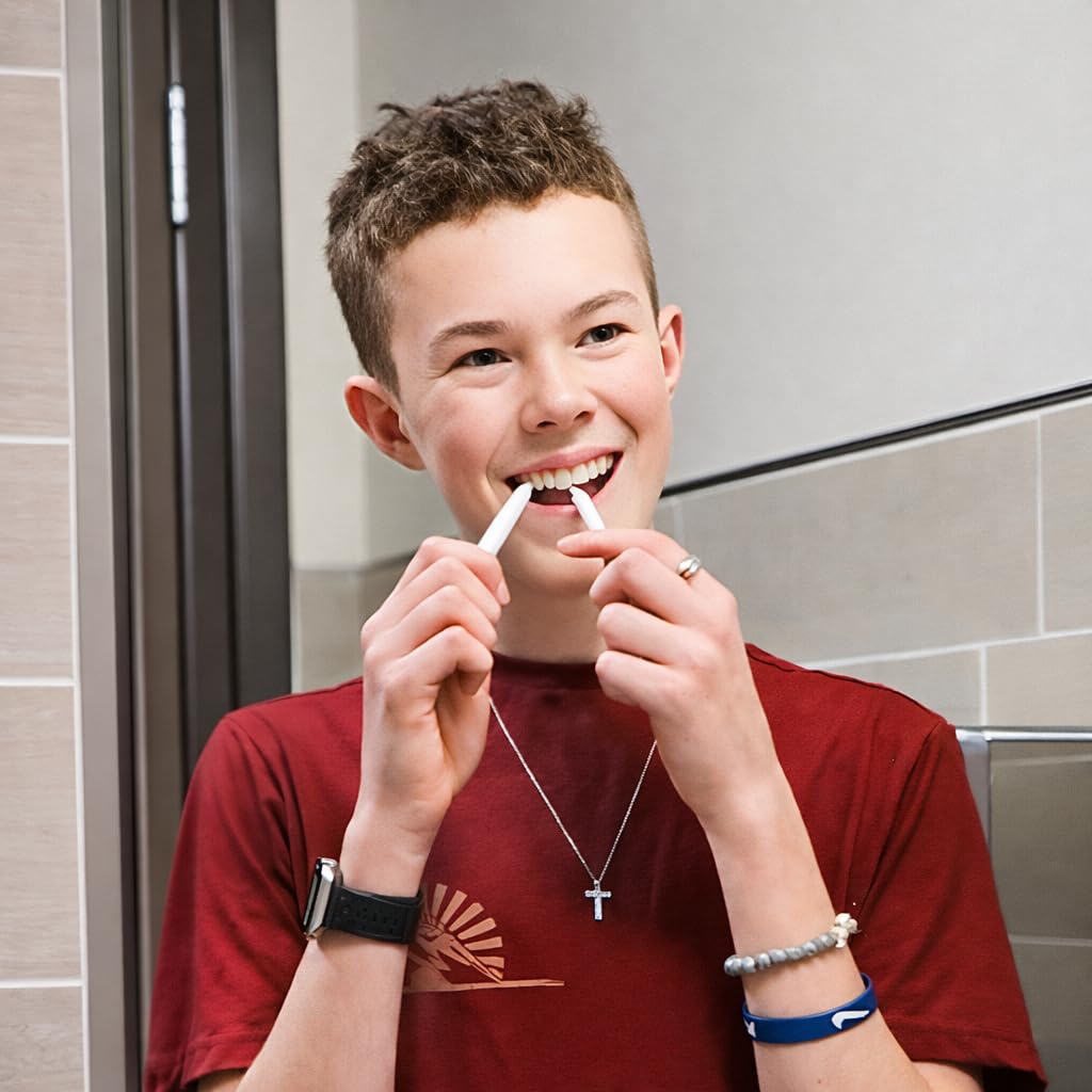 GumChucks reusable handles with disposable tips for hygienic flossing