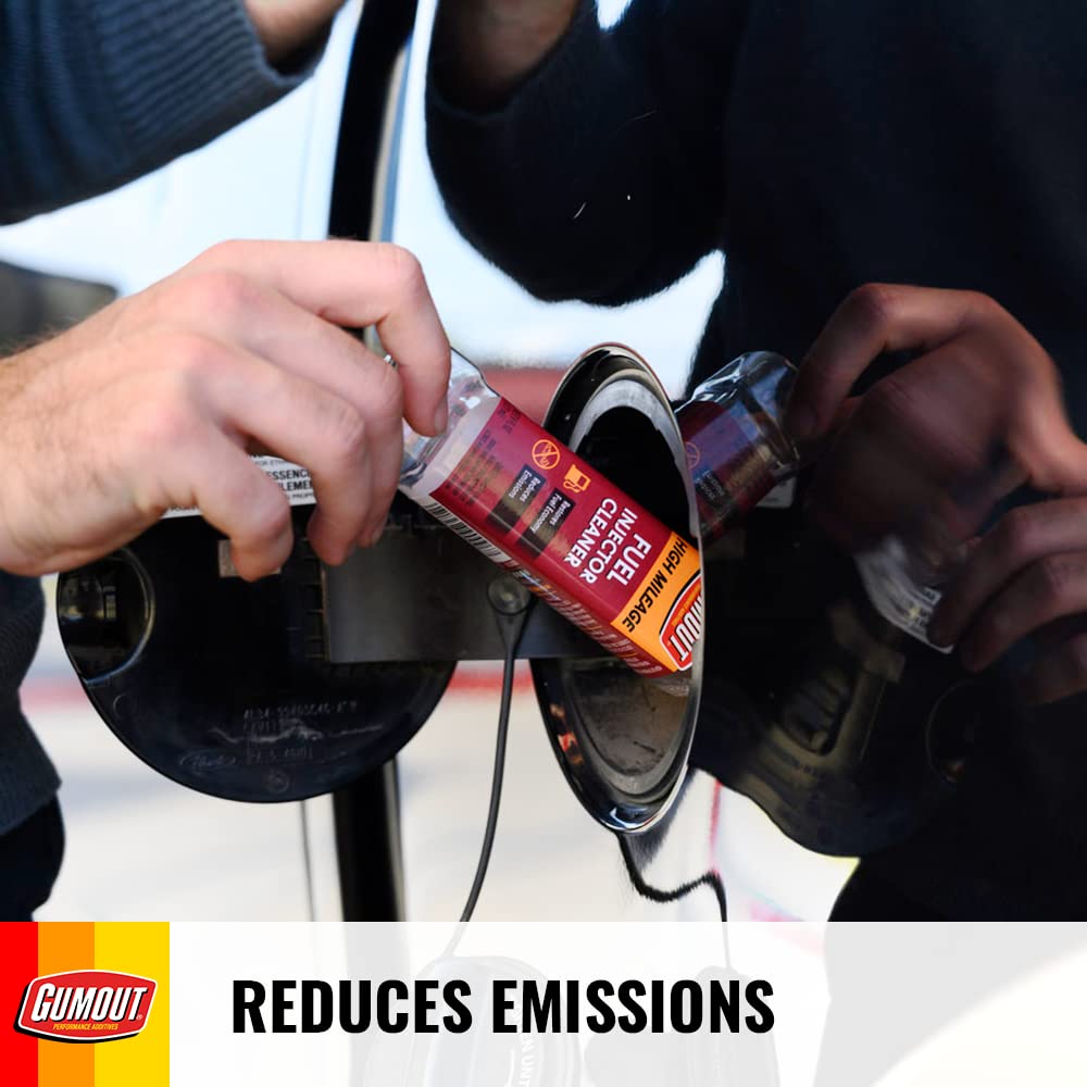 Gumout High Mileage cleaner being added to nearly empty tank before filling