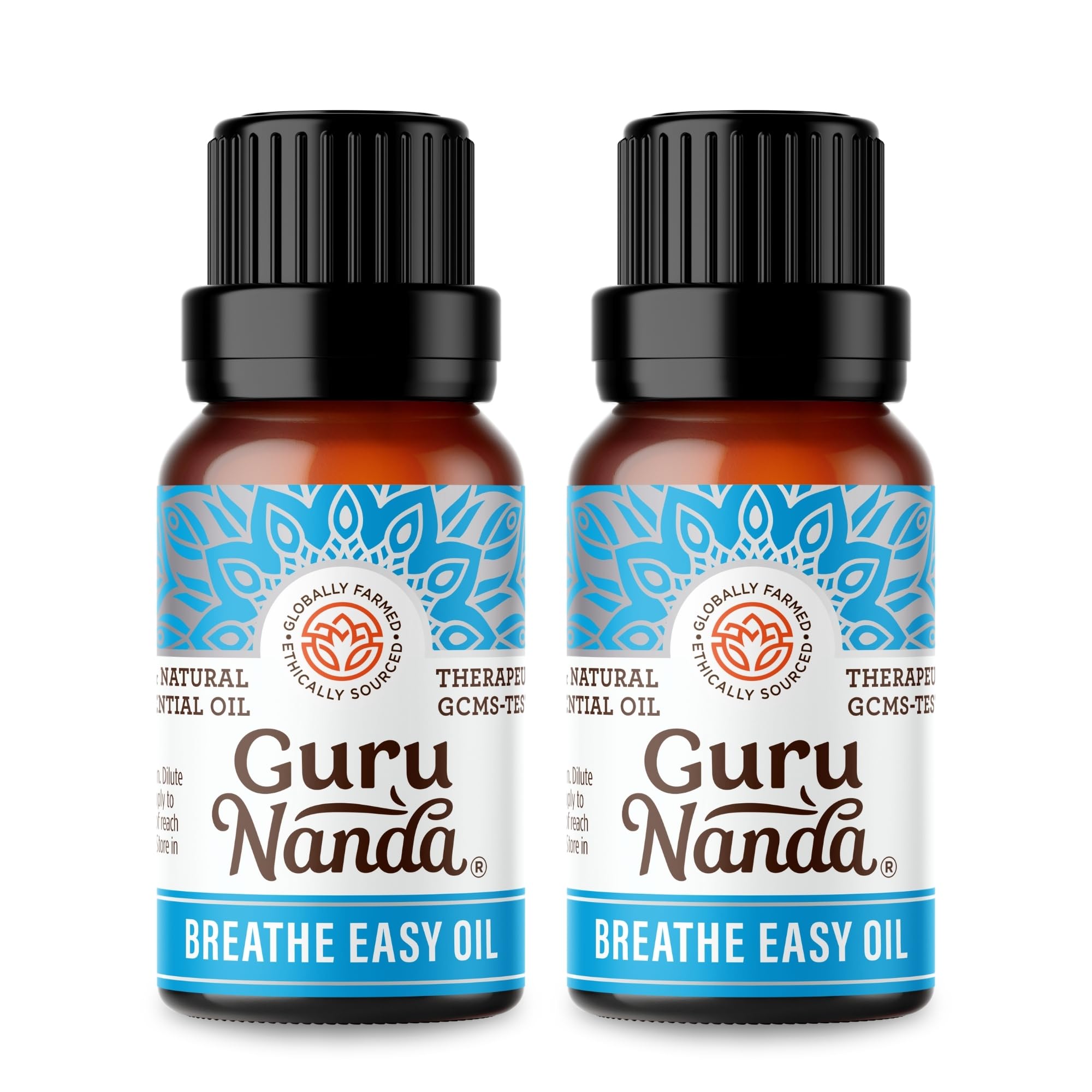 GuruNanda Breathe Easy bottle closeup showing pure essential oil for nasal comfort.