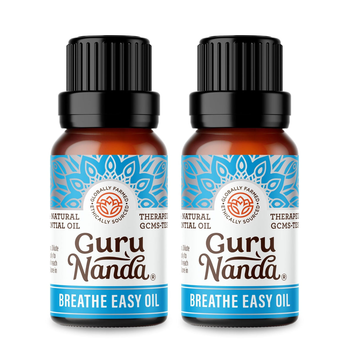 GuruNanda Breathe Easy bottle closeup showing pure essential oil for nasal comfort.