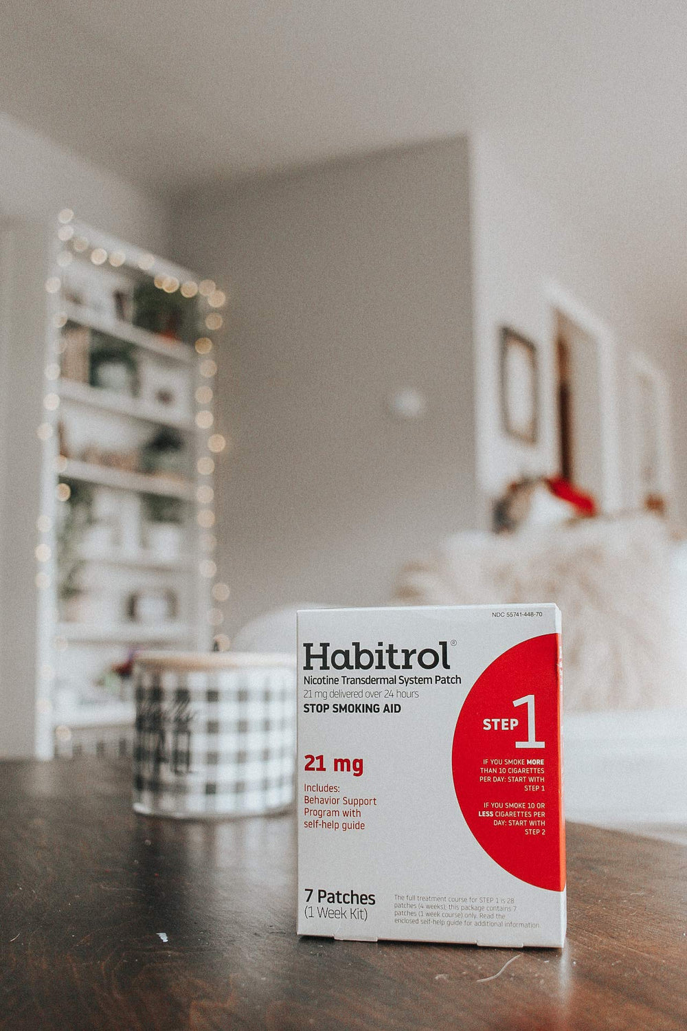 Habitrol patch applied on skin illustrating discreet 24-hour nicotine delivery.
